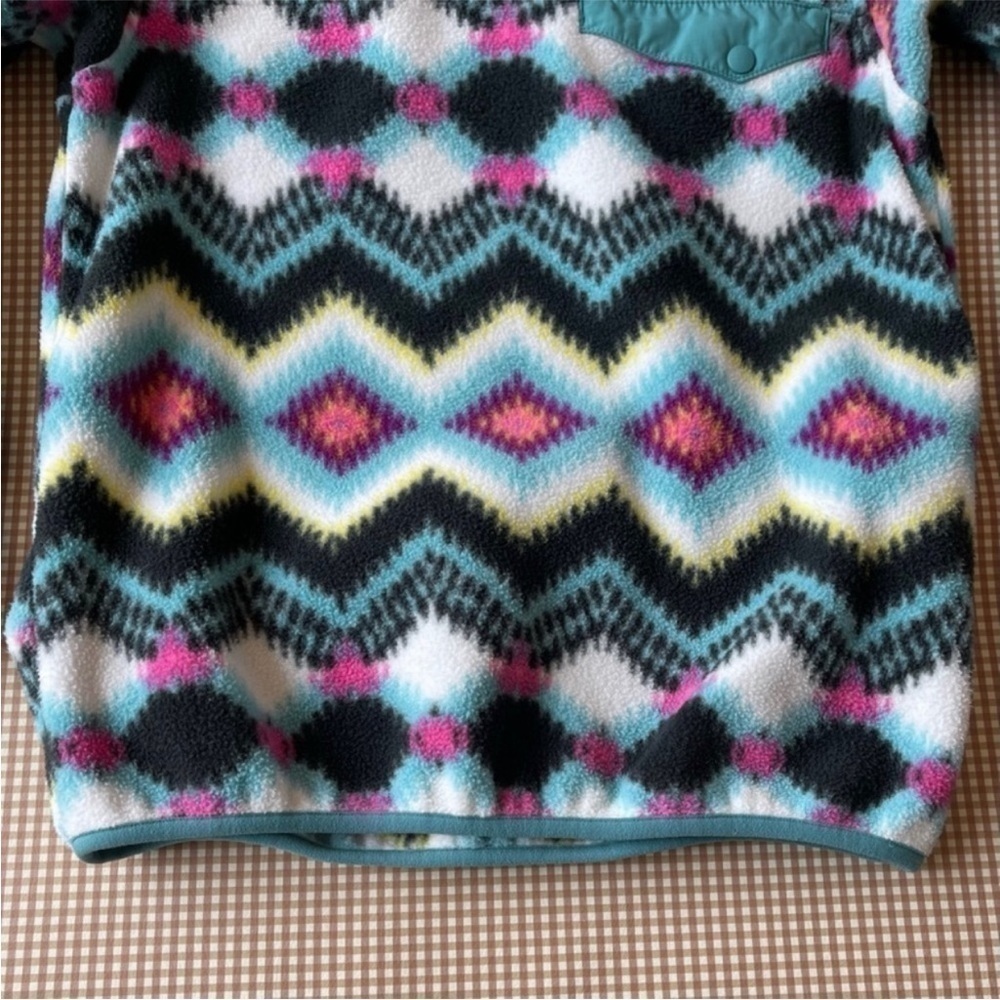 Patagonia Synchilla Snap-T tribal print fleece pullover.
Size XL. 14 years - Picture 15 of 15